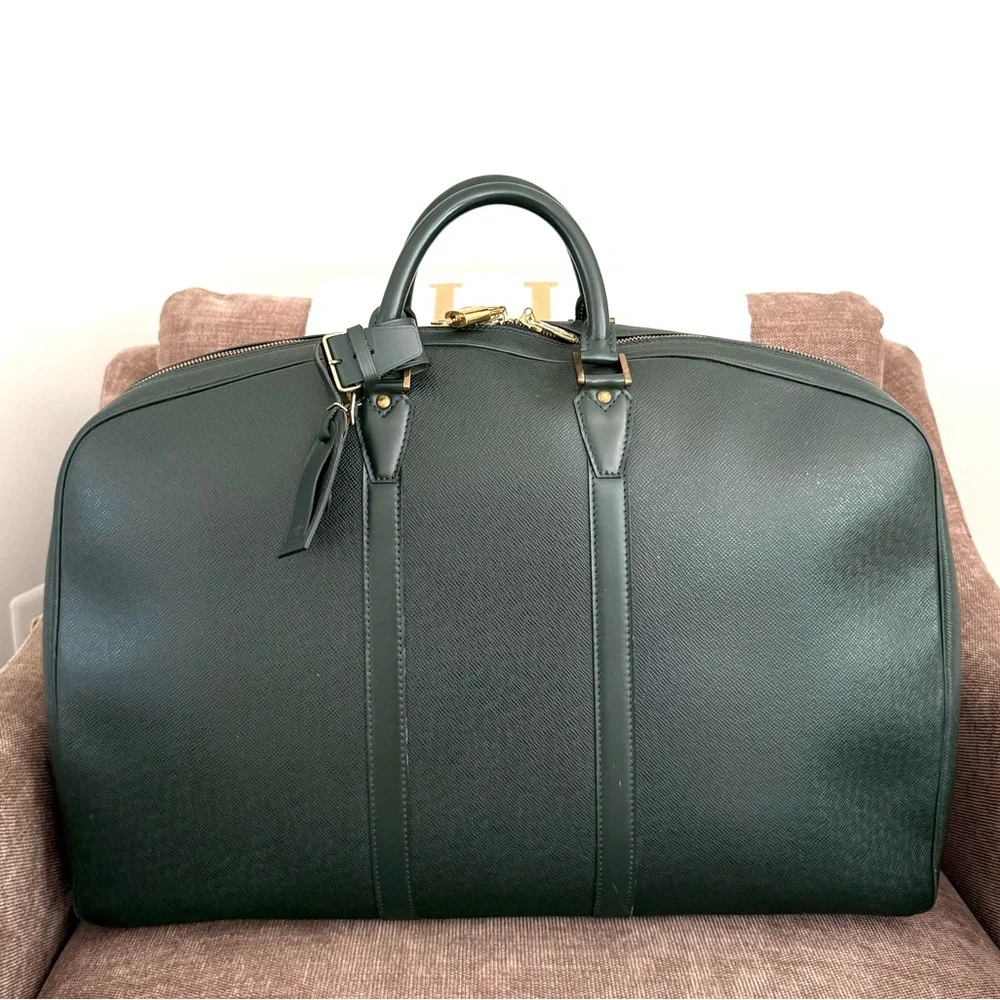 Authentic Louis Vuitton Epicea Taiga Leather Helanga En Poche Travel Bag M30104